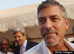 American actor George Clooney attends voting ceremonies during the first day of voting for the independence referendum in the southern Sudanese city of Juba January 9, 2011 in Juba, Sudan. (Photo by Spencer Platt/Getty Images)