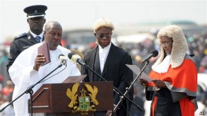 Ghanaian President John Mahama is sworn-in by Chief Justice Georgina Wood (R) at Independence Square, Accra, January 7, 2013