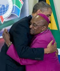 President Obama in a warm embrace with ArchBishop Desmond Tutu
