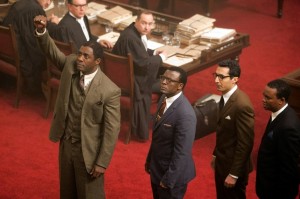 Idris Elba, Tony Kgoroge, Riaad Moosa and Zolani Mkiva in 'Mandela: Long Walk to Freedom.' Weinstein Co.