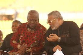 President John Mahama and former President Rawlings in glasses