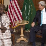 US Secretary of State John Kerry (R) meets with Olusegun Obasanjo, chairman of the African Union's South Sudan Commission of Inquiry, in Addis Ababa on May 2, 2014 (AFP Photo/Saul Loeb)