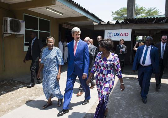 U.S. Secretary of State John Kerry (C) walks alongside Hospital Director Dolores Nembunzu (R) and Sister Mary Joseph (L) at the Fistula Clinic at Saint Joseph's Hospital, funded by USAID, in Kinshasa May 4, 2014.