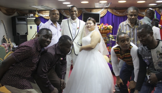 JENNIFER TSANG AND EMAN OKONKWO AT THEIR WEDDING IN GUANGZHOU IN APRIL. PHOTO: JENNI MARSH