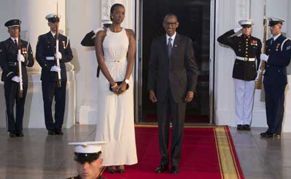 Rwanda President Paul Kagame and daughter arrive at the White House for a group dinner during the US Africa Leaders Summit August 5, 2014 in Washington, DC. AFP/PHOTO