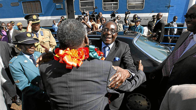 President Michael Sata of Zambia and Robert Mugabe of Zimbabwe .Both countries are experiencing succession battles