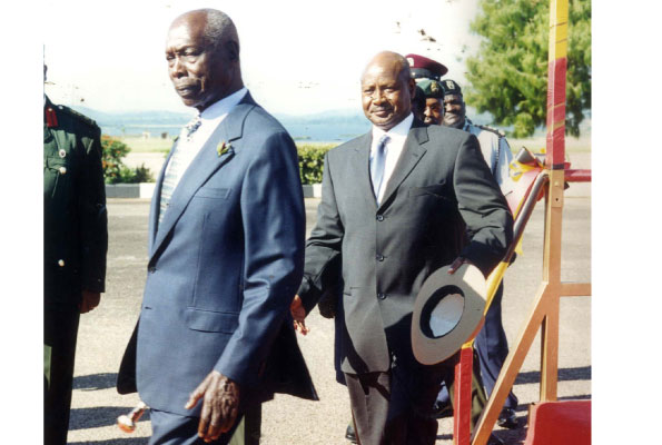 Mr Moi with President Museveni when he visited Uganda in the late 1990s. File photo