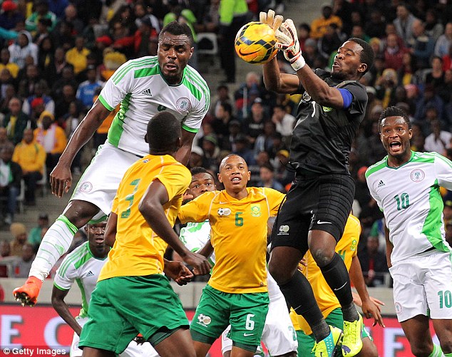 Senzo Meyiwa (right, playing for South Africa) was shot dead on Sunday, police have confirmed