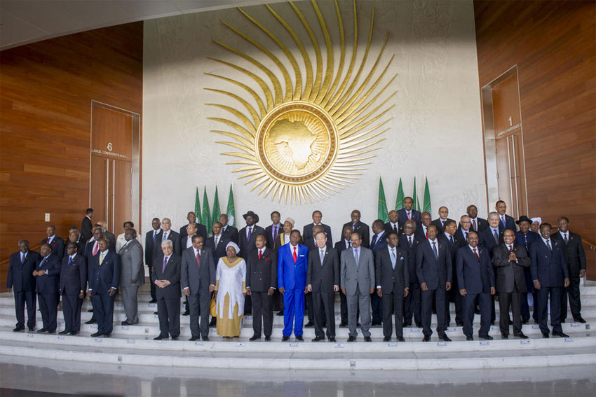 Secretary-General Ban Ki-moon poses for a group photo with leaders attending the African Union Summit, which marks the 50th anniversary of the founding of the Organization of African Unity. UN Photo/Eskinder Debebe
