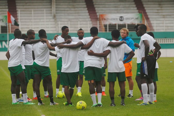 Sierra Leone's national team at a training session in Abidjan, Ivory Coast. The players continue to face reminders of the Ebola crisis. Credit Luc Gnago/Reuters