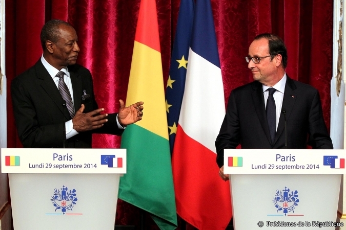 Guinea's Alpha Conde and French President Francois Hollande