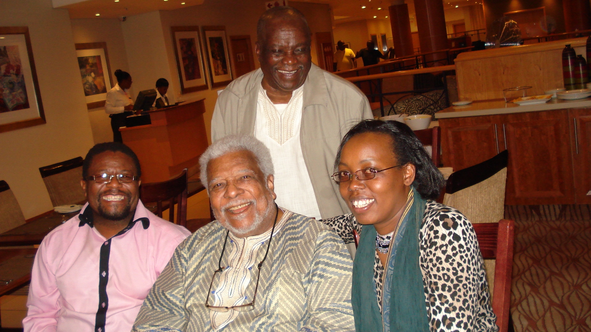 From right seated Esther Githinji, Professor Ali Mazrui & Professor James Kariuki standing