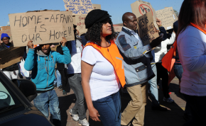 Photo: Werner Beukes/Sapa Protesters demonstrate during a march to the home affairs department against revised immigration regulations in Johannesburg on Wednesday, 25 June 2014
