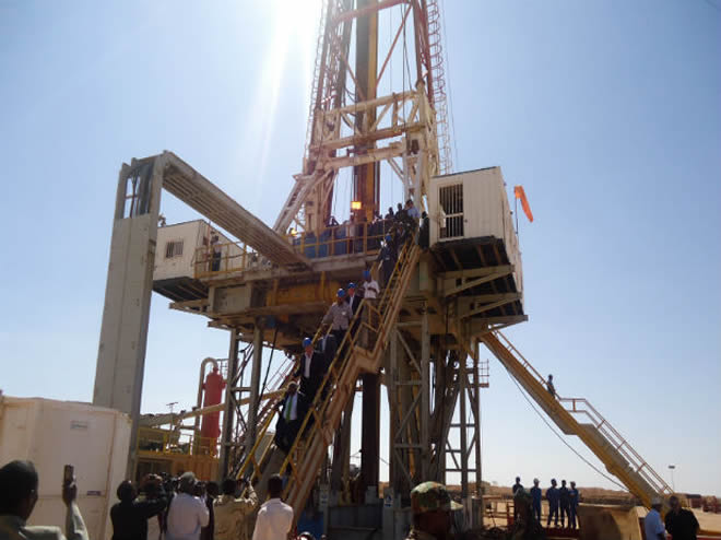 Engineers and visitors explore an exploratory well near Dharoor town, 350 km (217 miles) from the port of Bosasso on the Gulf of Aden in Puntland, January 17, 2012. (Abdiqani Hassan /Courtesy Reuters)