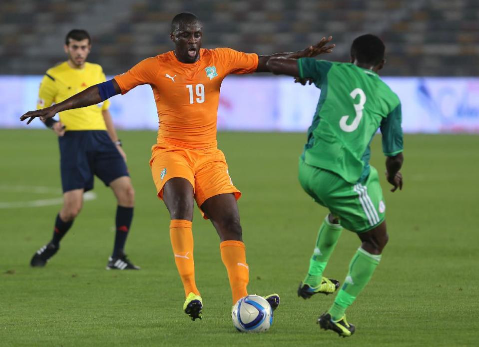 Ivory Coast's Yaya Toure (C) during an international friendly football match in preparation for the Africa Cup of Nations on January 11, 2015 (AFP Photo/)