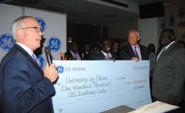 Photo: University of Ghana Vice-Chancellor Prof. Ernest Aryeetey (right), receiving the symbolic cheque on behalf of the University. With him are Mr. Jeff Immelt, Global Chairman of GE (second from right) and Hon. Emmanuel Kofi Buah, Minister of Energy and Petroleum (third from right)