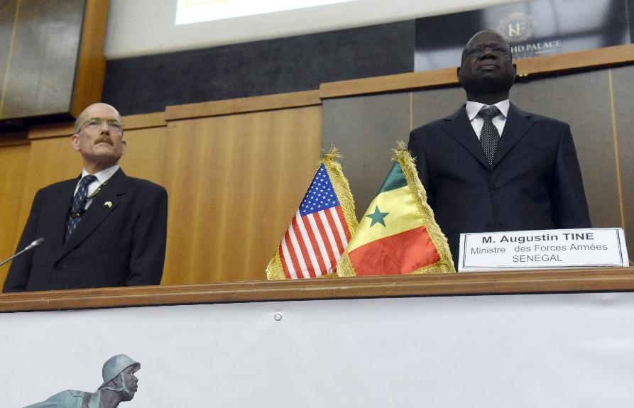 US Ambassador to Senegal James Peter Zumwalt (L) and Senegalese Defense Minister Augustin Tine attend the opening of the African Land Forces summit on February 9, 2015 (AFP Photo/Seyllou