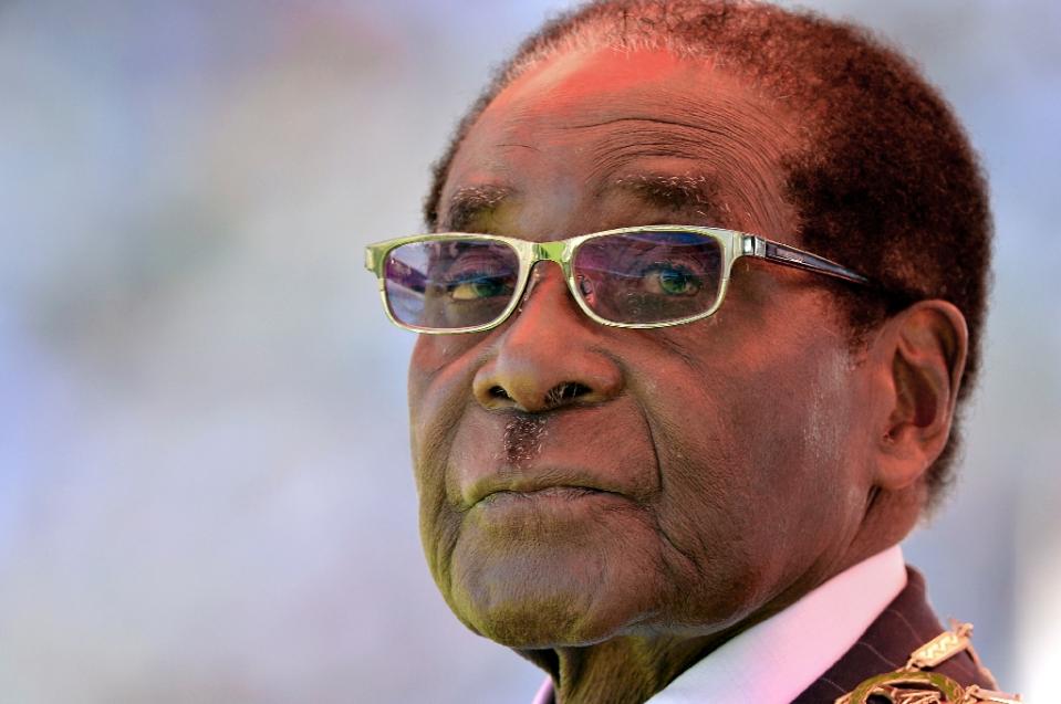 Zimbabwean President Robert Mugabe attends his inauguration and swearing-in ceremony at the sports stadium in Harare on August 22, 2013 (AFP Photo/Alexander Joe)