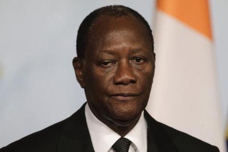 Ivory Coast's President Alassane Ouattara attends a news conference at the Elysee palace in Paris, December 4, 2014. REUTERS/Philippe Wojazer