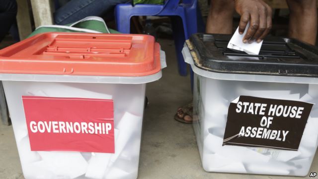 A man casts a ballot in Lagos, Nigeria, April 11, 2015.