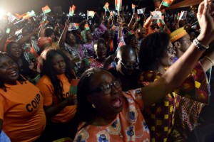 Supporters of Burkina Faso's new president Roch Marc Christian Kabore celebrate at party headquarters in Ouagadougou on December 1, 2015 after he won Burkina Faso's presidential election (AFP Photo/Issouf Sanogo)