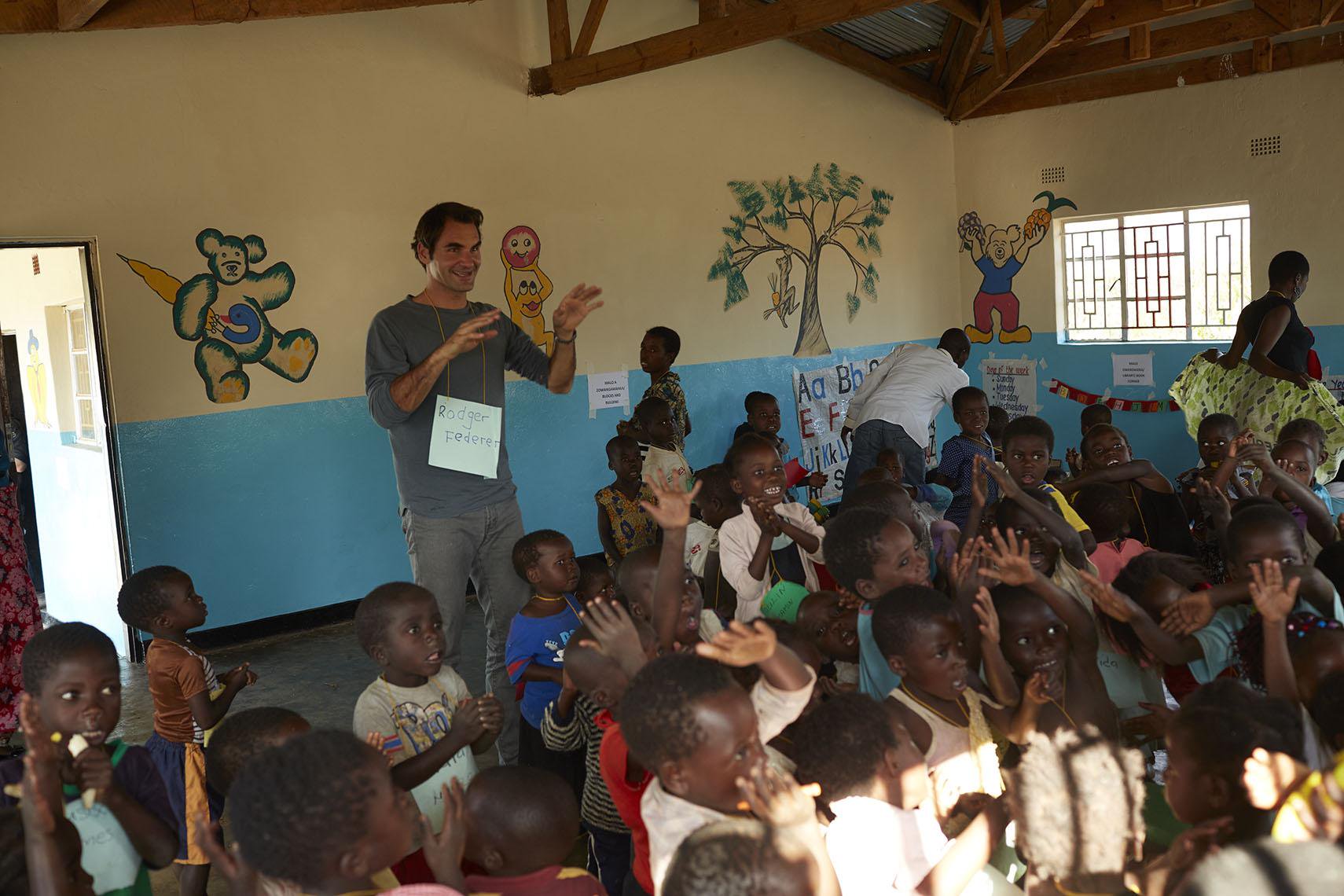 File Picture.Federer in a previous visit to Malawi.His School Readiness Programme is expected to help thousands of early childhood going children up to 2025