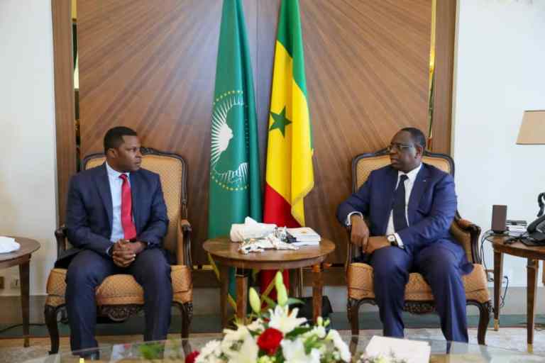 NJ Ayuk of the African Energy Chamber with Senegalese President Macky Sall