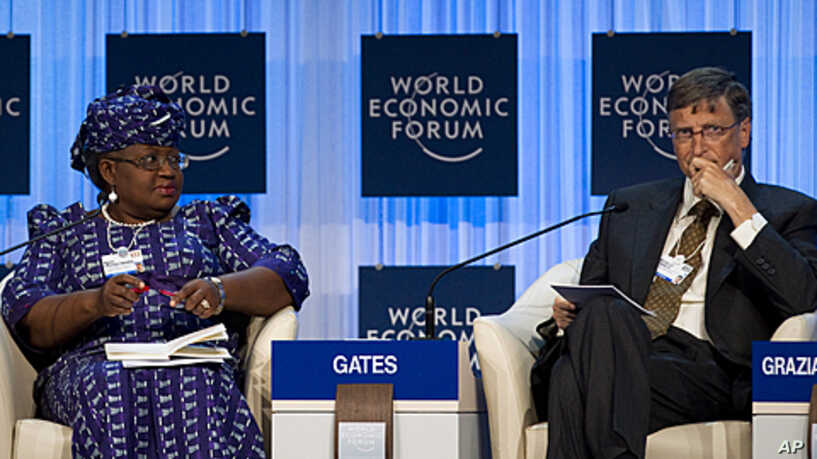 Dr. Ngozi Okonjo-Iweala, Chair of the Gavi Board with Bill Gates.File Picture from a panel discussion at the World Economic Forum in Davos 2012