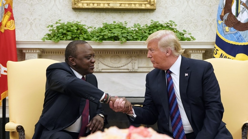 Kenya President in a handshake with U.S. President during a 2018 Washington DC meeting (Photo: MANDEL NGAN/AFP via Getty Images)