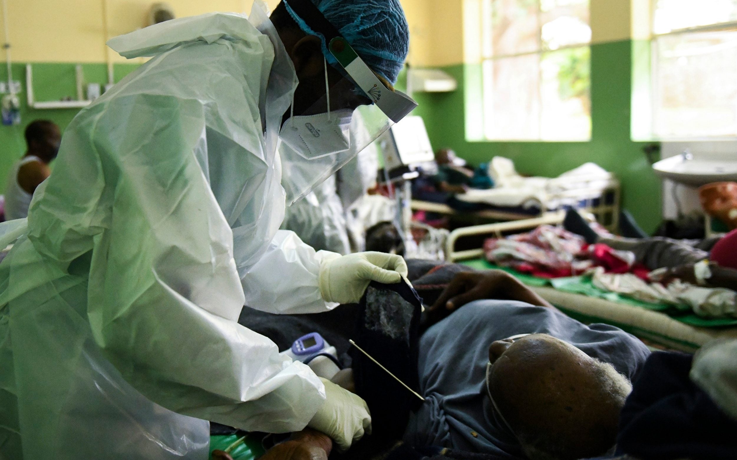 Health worker attending to COVID 19 patients in Malawi.Photo credit Thoko Chikondi/AP
