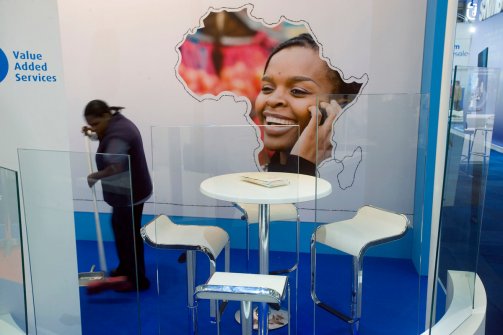 A worker cleans a stand during the opening day of the Africacom Telecommunications Conference on November 14, 2012 in Cape Town, South Africa. The number of Africa's mobile subscriptions will reach 761 million this year, making the continent once again the fastest growing market in the world. The number of subscriptions in Africa is set to hit one billion by 2015, London-based Informa Telecoms & Media said. (Rodger Bosch/AFP/Getty)