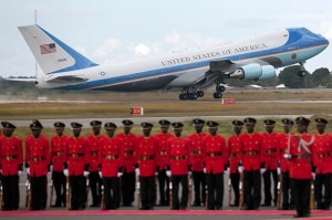 Air Force One takes off as a Tanzanian honor guard stands to attention at the Julius Nyerere airport on Tuesday, Juy 2, 2013, in Dar es Salaam, Tanzania. (Ben Curtis/AP)