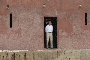 U.S. President Barack Obama looks out to sea through the 'Door of No Return,' at the slave house on Goree Island, in Dakar, Senegal, Thursday, June 27, 2013. Obama is calling his visit to a Senegalese island from which Africans were said to have been shipped across the Atlantic Ocean into slavery, a 'very powerful moment. AP Photo/Rebecca Blackwell)