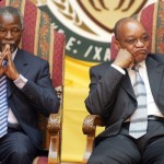 Thabo Mbeki and Jacob Zuma, seated in front during the swearing in of the ministers at the Union buildings in Pretoria, 2004.