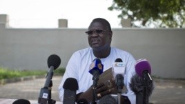 FILE - A July 26, 2013 photo shows former South Sudan VP Riek Machar speaking to the media to announce he will run for the presidency in 2015 against President Salva Kiir, who sacked Machar and his cabinet this week, Juba, South Sudan.