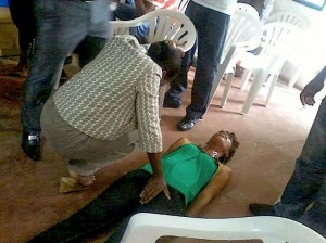 A woman going through a “deliverance session” in church