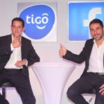 It’s thumps up by Tigo Tanzania General Manager, Diego Gutierrez (L), and Facebook representative, Nicola D’Elia, during the launch of a historic partnership between their two companies today in Dar es Salaam