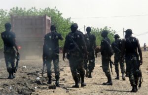 Armed Cameroonian men of the rapid intervention battalion (BIR) patrol in Waza, northern Cameroon on May 29, 2014 (AFP Photo/Reinnier Kaze)