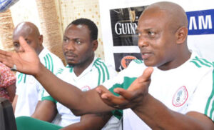 From Left: National Team Goalkeeper Trainer, Ike Shorunmu; Assistant Coach, Daniel Amokachi, and Super Eagles Chief Coach, Stephen Keshi during a media parley in Abuja 