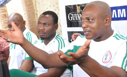 From Left: National Team Goalkeeper Trainer, Ike Shorunmu; Assistant Coach, Daniel Amokachi, and Super Eagles Chief Coach, Stephen Keshi during a media parley in Abuja