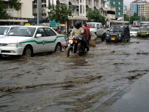 A motorcyclist negotiates his way through a flooded road along Bibi titi Mohamed street in Dar es Salaam, following a heavy downpour in March 2014. THOMSON REUTERS FOUNDATION/Zuberi Musa