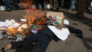 Political tensions remain high - this effigy of opposition leader Raila Odinga was set on fire last month