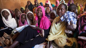 Women and girls at the Abu Shouk camp for internally displaced persons in Sudan attend an English class facilitated by the African Union-United Nations Hybrid Operations in Darfur. Investing in women and girls is the most cost-effective way to advance the Millennium Development Goals. Photo by: Albert González Farran / United Nations / CC BY-NC-ND