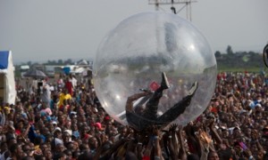 Akon rolls among the crowd in Goma. Photograph: Phil Moore/AFP/Getty Images