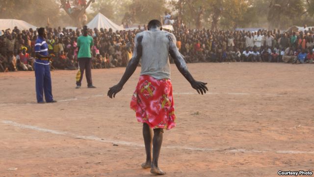 Wrestlers in a camp for war-displaced Nuba struggle to maintain their cultural strength in a documentary film (Courtesy Hajooj Kuka)