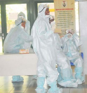 HEALTH PERSONNEL IN PROTECTIVE KITS AT THE NATIONAL HOSPITAL IN ABUJA ON TUESDAY 