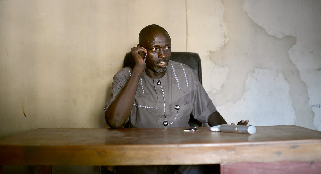 Abba Aji Kalli at his Civilian Joint Task Force office in Maiduguri, Nigeria. Credit Benedicte Kurzen/Noor Images