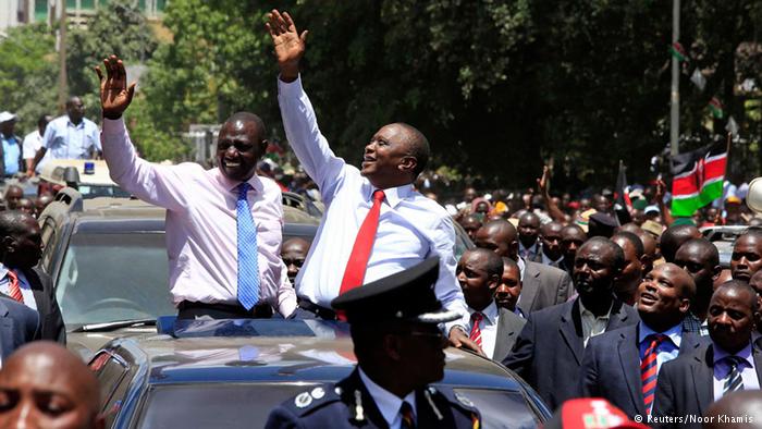 Cheering crowds welcome Kenyatta on return from The Hague