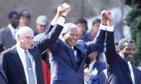Nelson Mandela at his presidential inauguration with his deputies, FW de Klerk and Thabo Mbeki