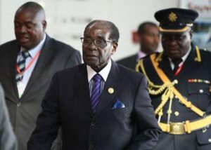 Zimbabwe's President Robert Mugabe (C) arrives for the 24th Ordinary session of the Assembly of Heads of State and Government of the African Union (AU) at the African Union headquarters in Ethiopia's capital Addis Ababa, January 31, 2015. REUTERS/Tiksa Negeri 